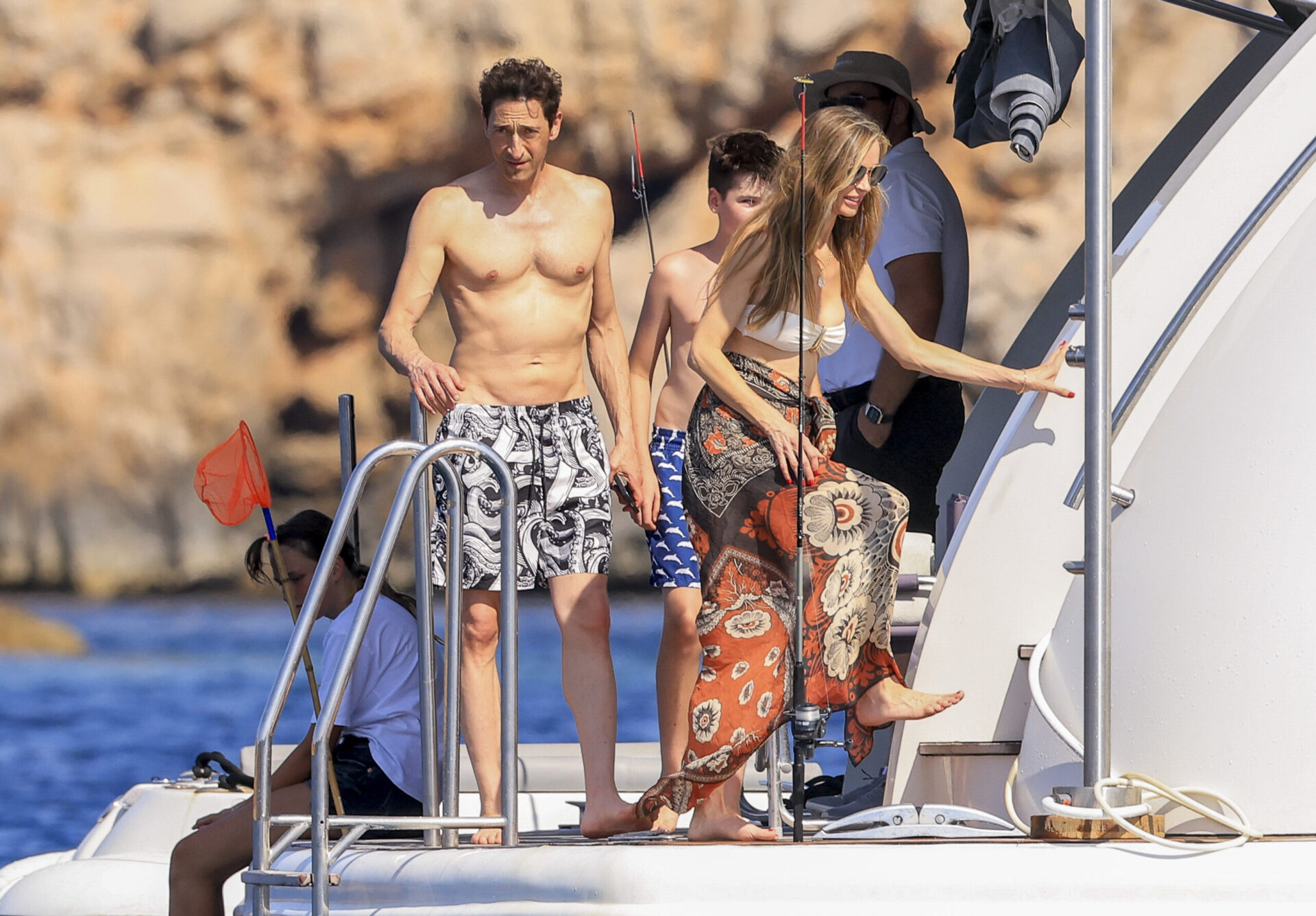 Harvey Weinstein Said from Prison He’s “Happy” His Ex-Wife Found Love with Adrien Brody. She’s Now Vacationing with Him in Ibiza, and the Kids Call Him “Popsy”