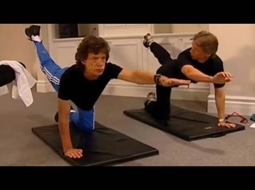 Mick Jagger doing leg raises