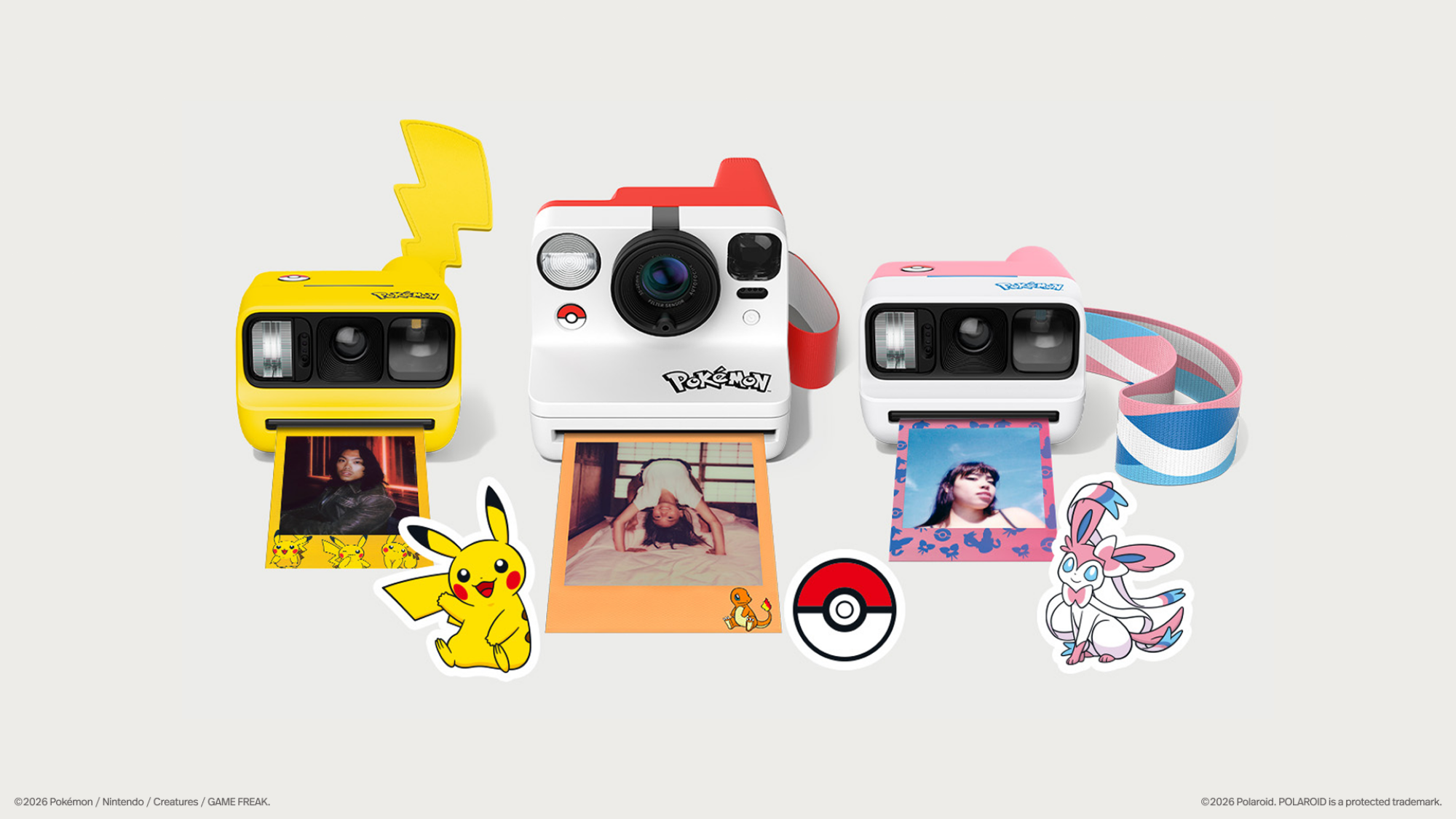 three Pokemon polaroid cameras