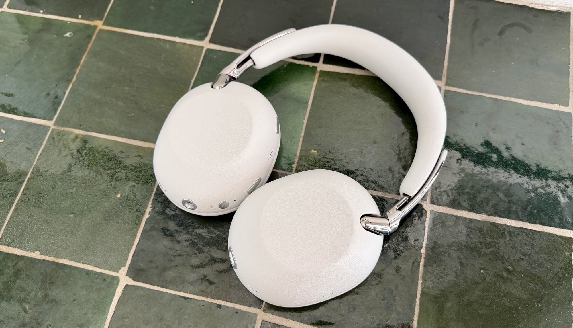 sony collexion headphones on green tile countertop