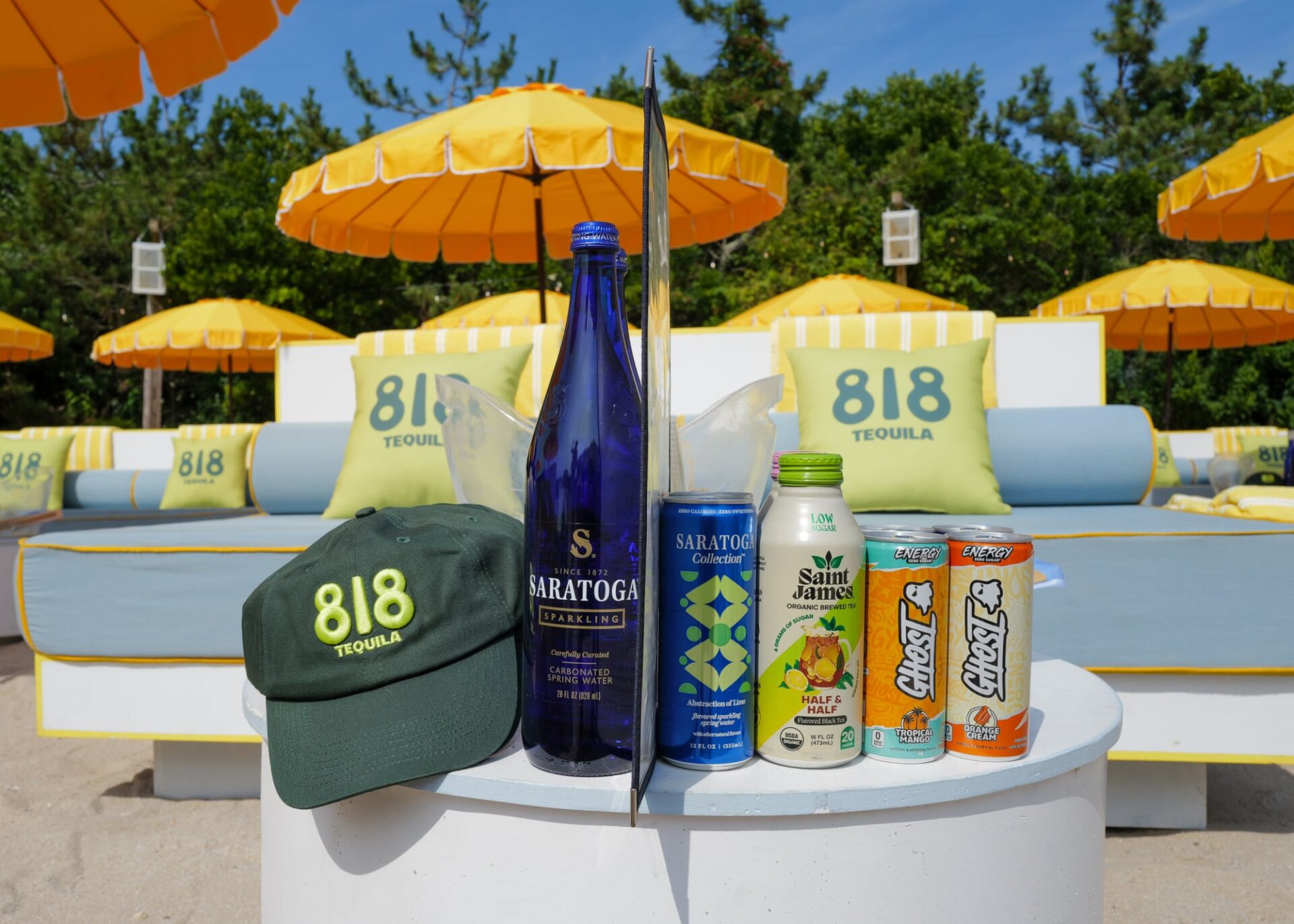 An 818 baseball hat, Saratoga water, and other canned beverages served at The Surf Lodge