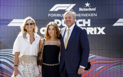 Princess Alexia Wore a Sleeveless Jumpsuit and a Gold Chain Belt to a Rain-Soaked Grand Prix