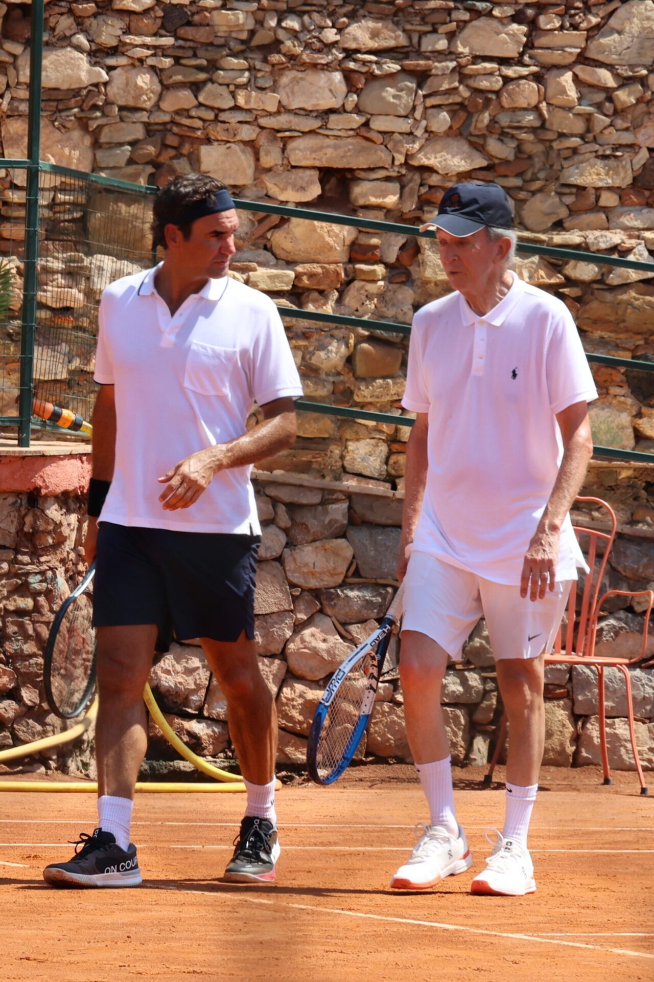 Roger Federer Spent His Sicilian Vacation Playing Doubles with the Richest Man in Europe, Then Walked His Own Wife Through the Man’s Boutiques