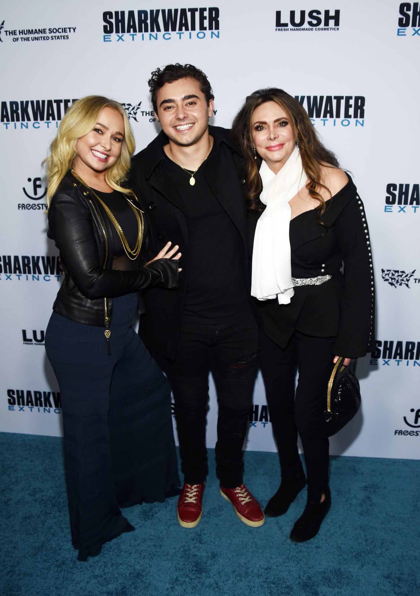 Hayden Panettiere, Jansen Panettiere, and Lesley Vogel posing together at a movie screening at ArcLight Hollywood