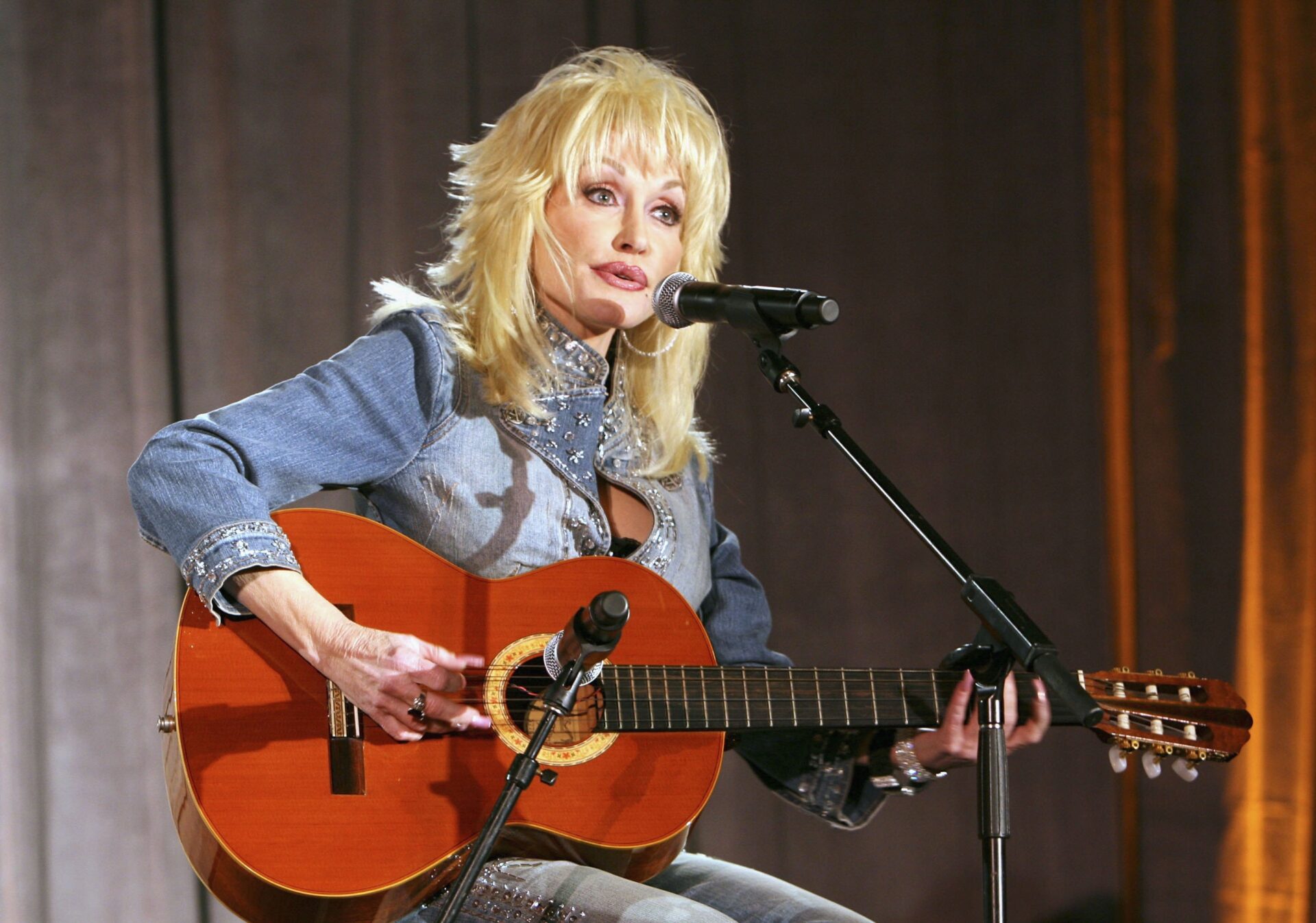 Dolly Parton performing at the Weinstein Co. Pre-Oscar Party at the Pacific Design Center in Los Angeles