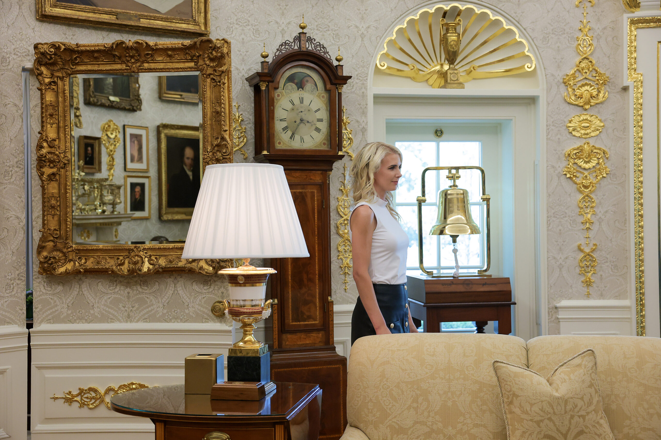 Natalie Harp standing in the Oval Office as President Trump signs an executive order on childhood vaccine shots