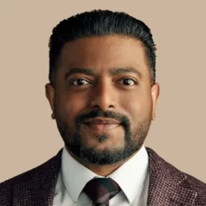 A headshot of Mark Manickaraj