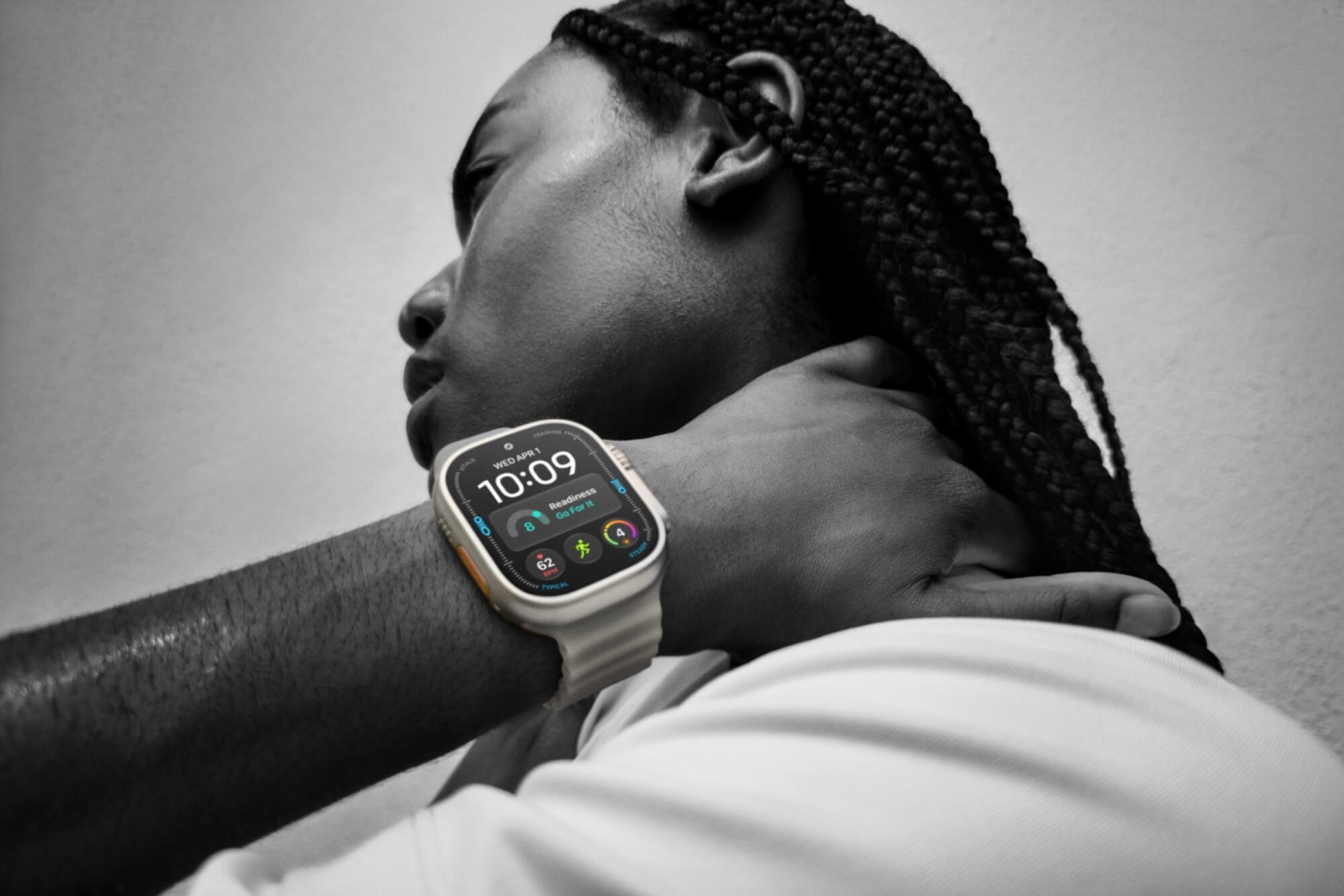 a man wearing the apple watch ultra 4