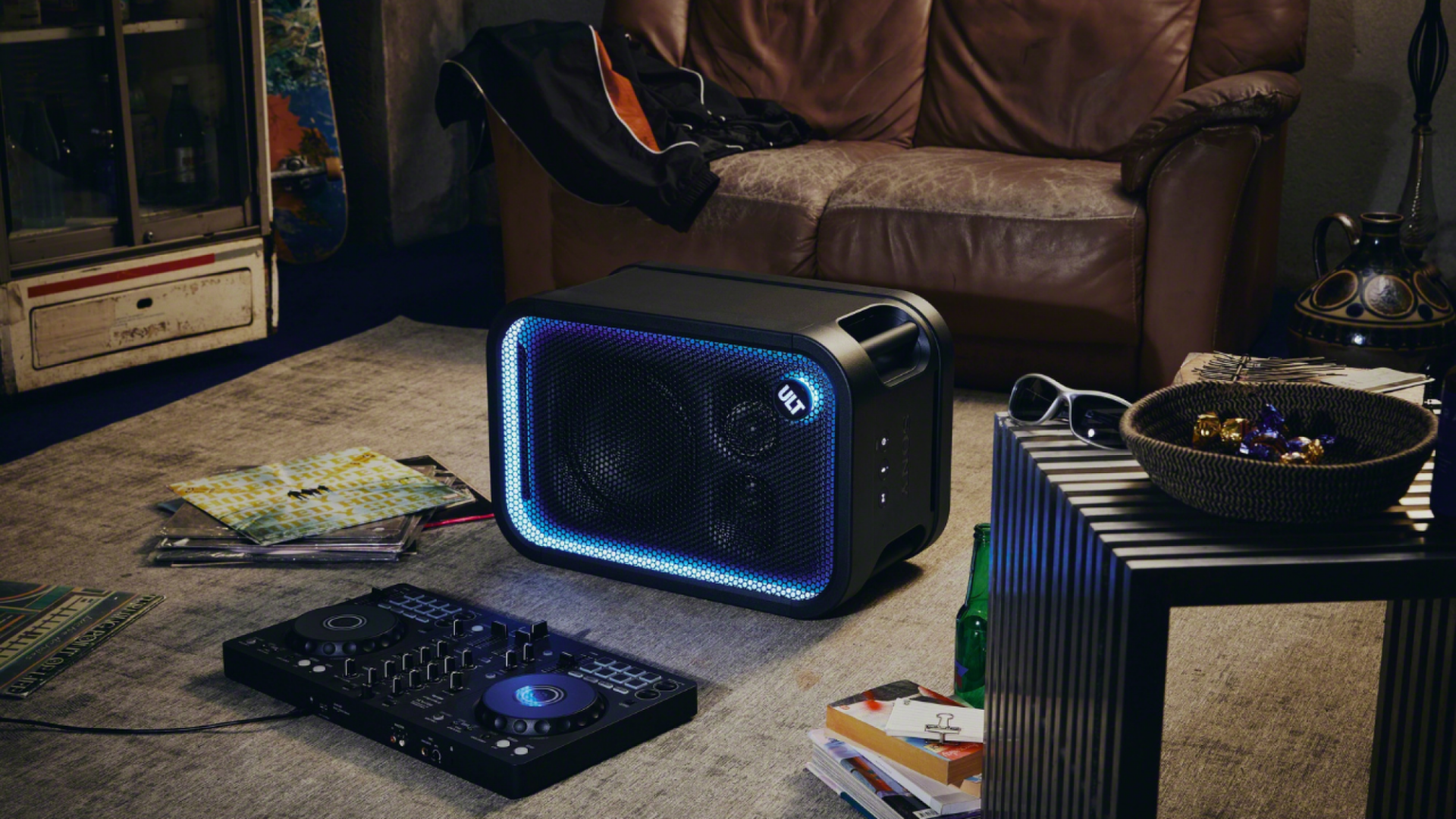 Sony ULT Tower 5 on the floor next to DJ equipment