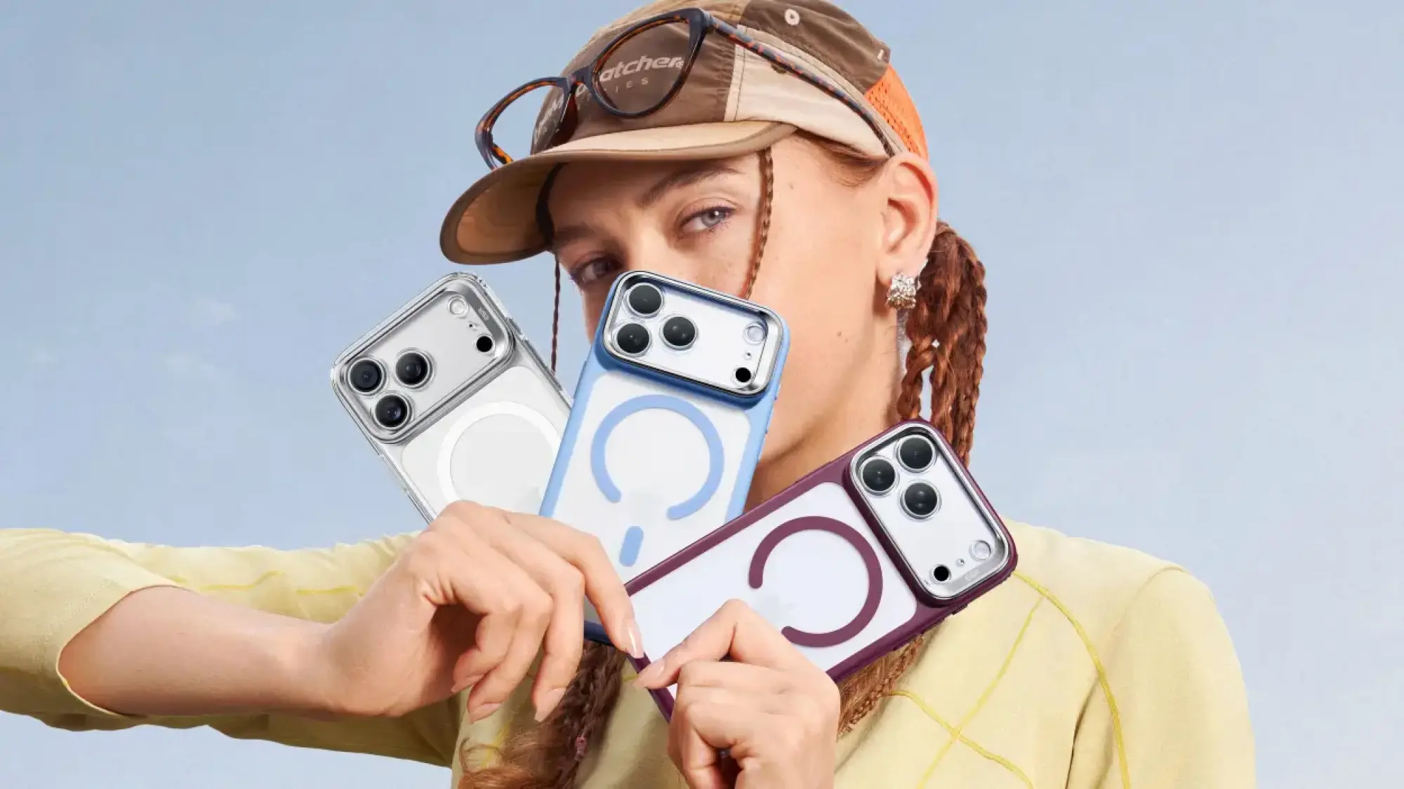 woman holding three iphone 18 pro max phones in magnetic cases