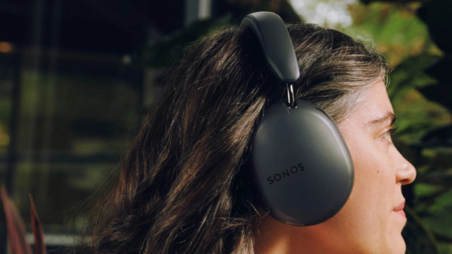 A person wearing the Sonos Ace Ultra
